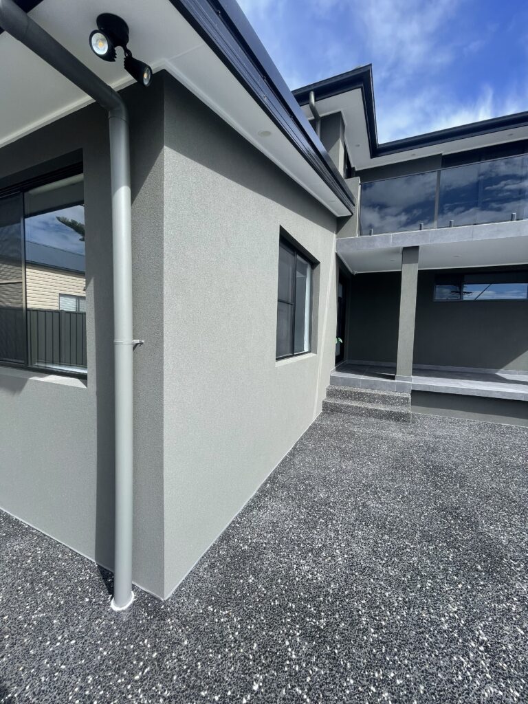 Professional exterior rendering on Wollongong home